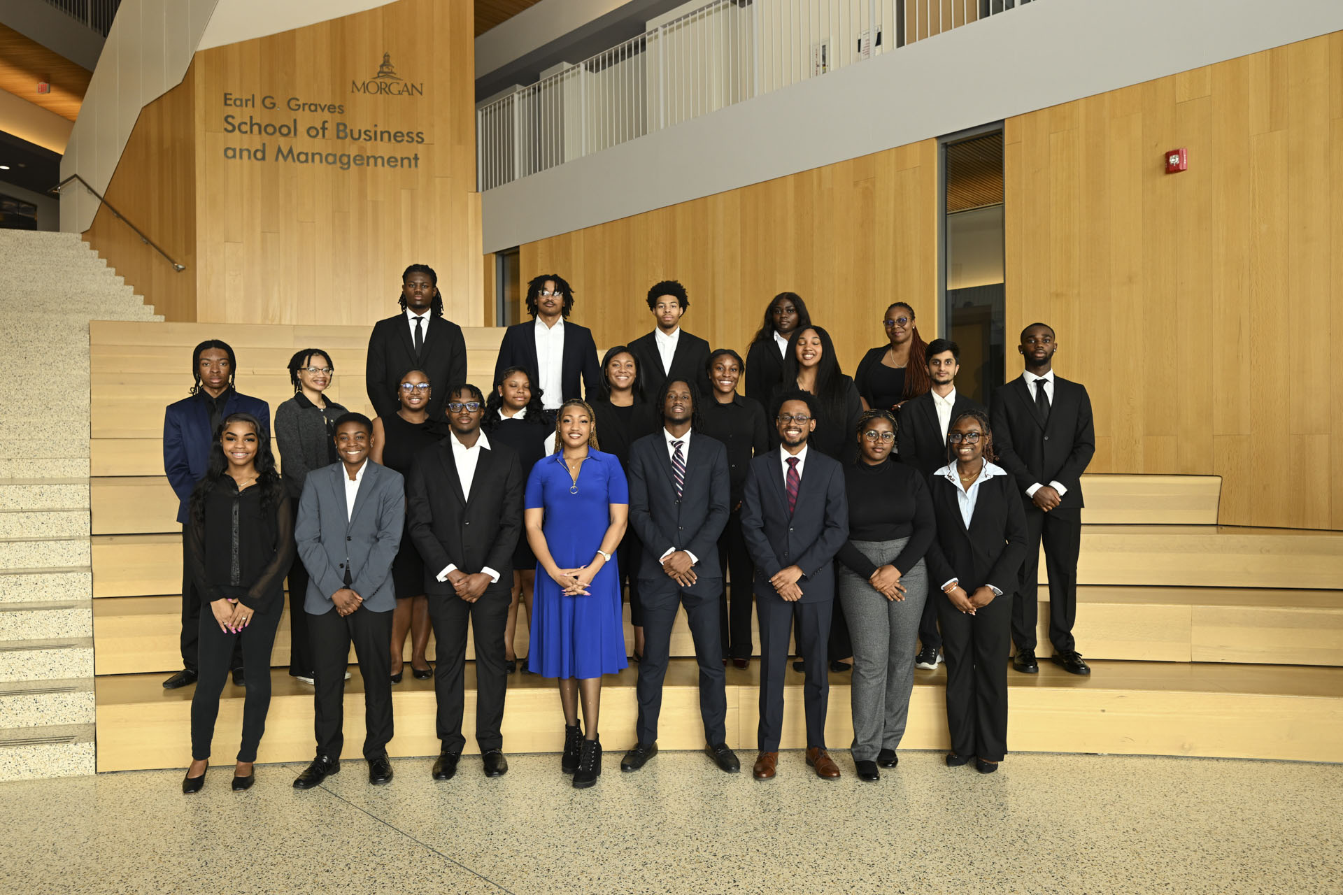 Student members of the Graves School Investment Club gather in the atrium of the Morgan Business Center.