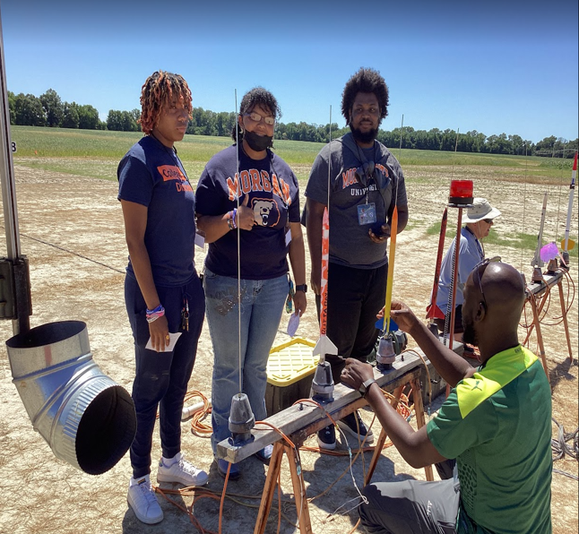 Students with rockets learning