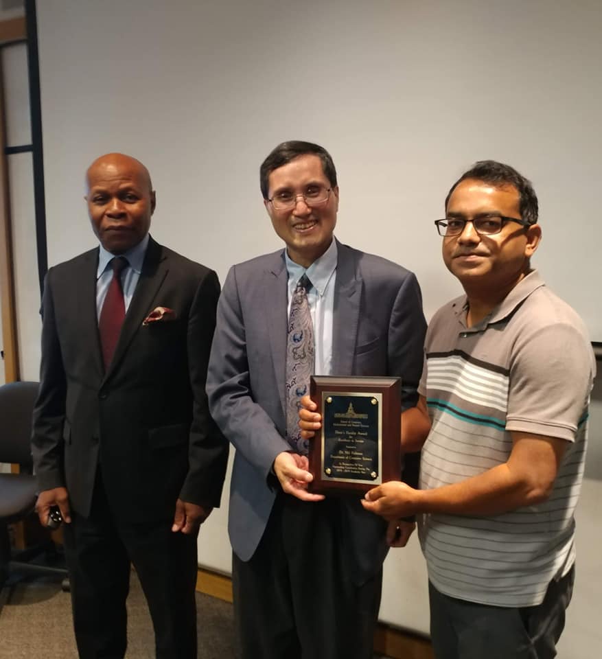 Dr. Rahman for receiving the Best Service Award
