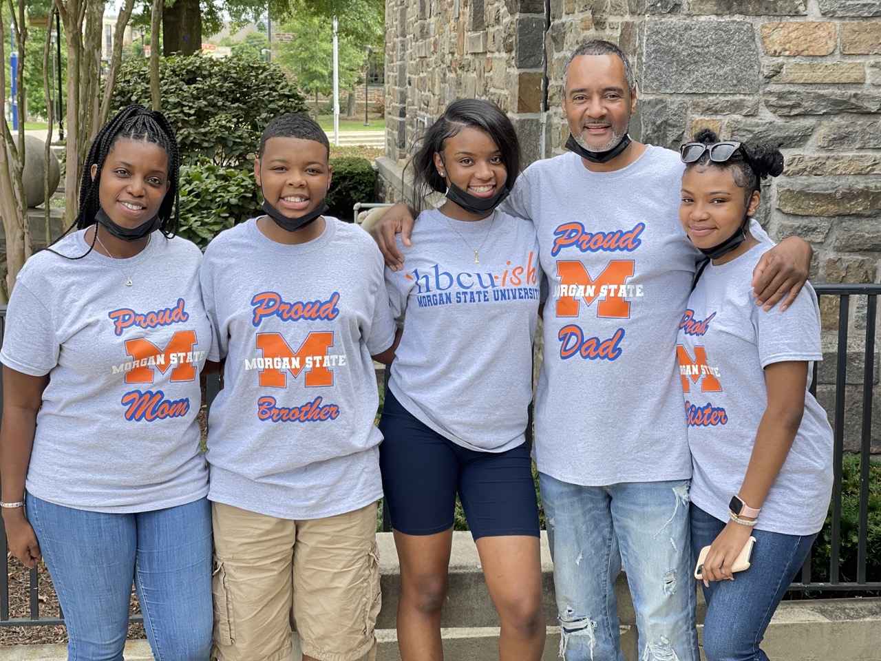 Residence Life staff smiling with graduating students