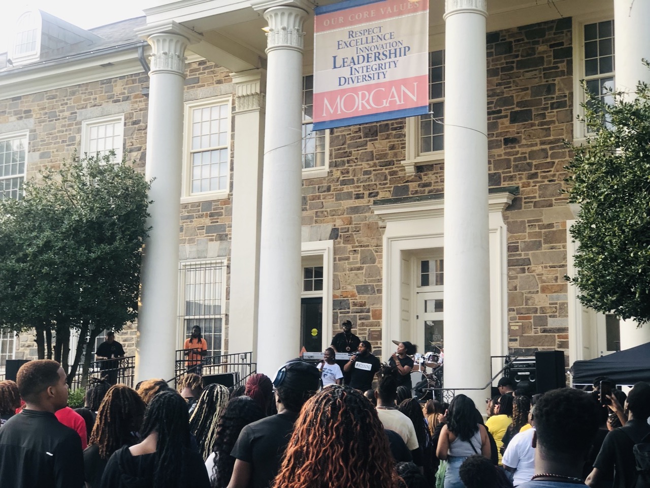 students in front of Holmes Hall