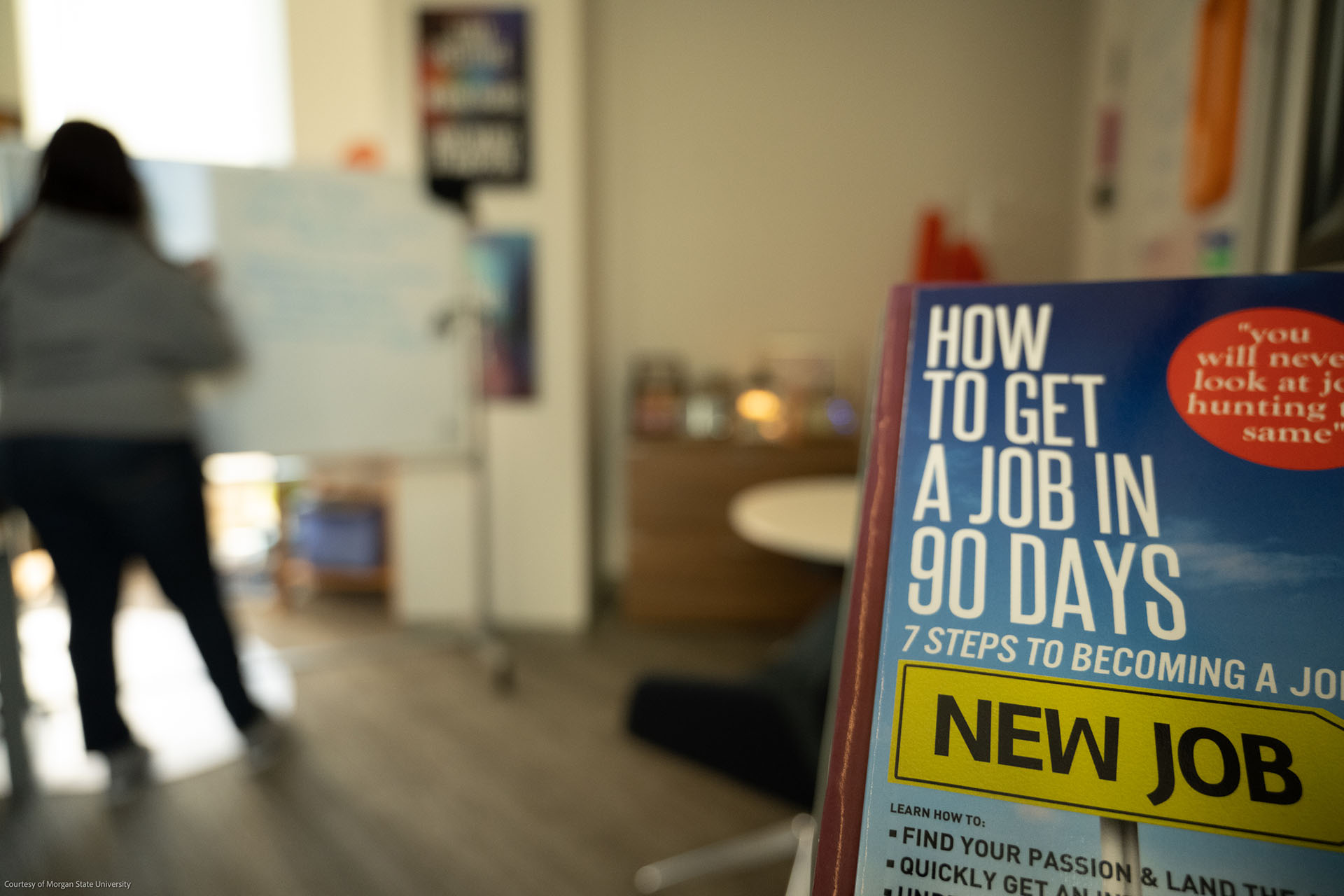 How to get a job in 90 days poster with female individual standing in background