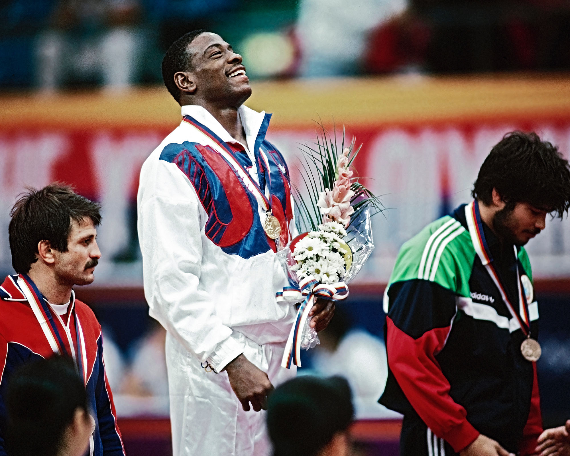 Kenny Monday receiving his olympic medal