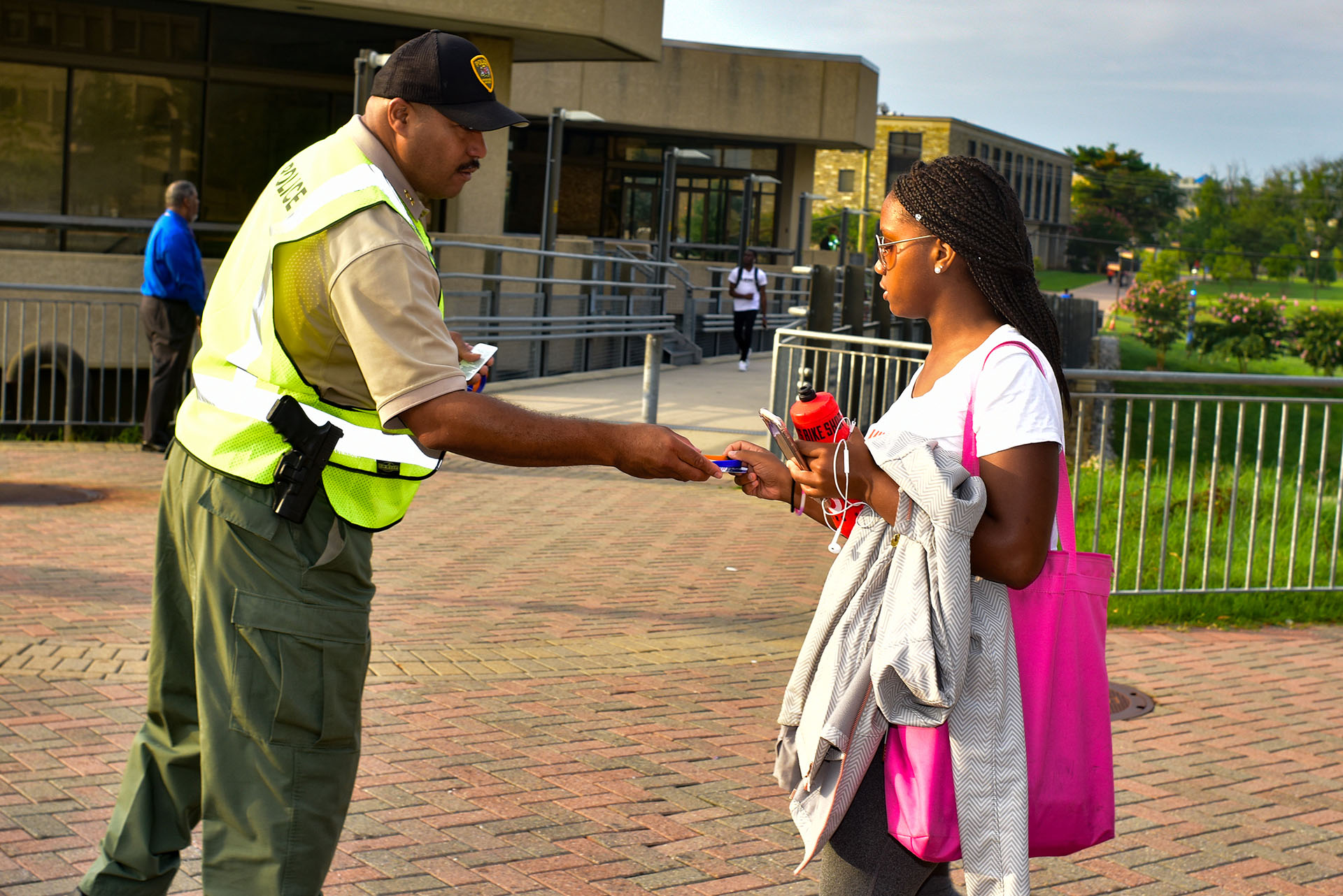 Police Chief Hatcher interacting with a female student