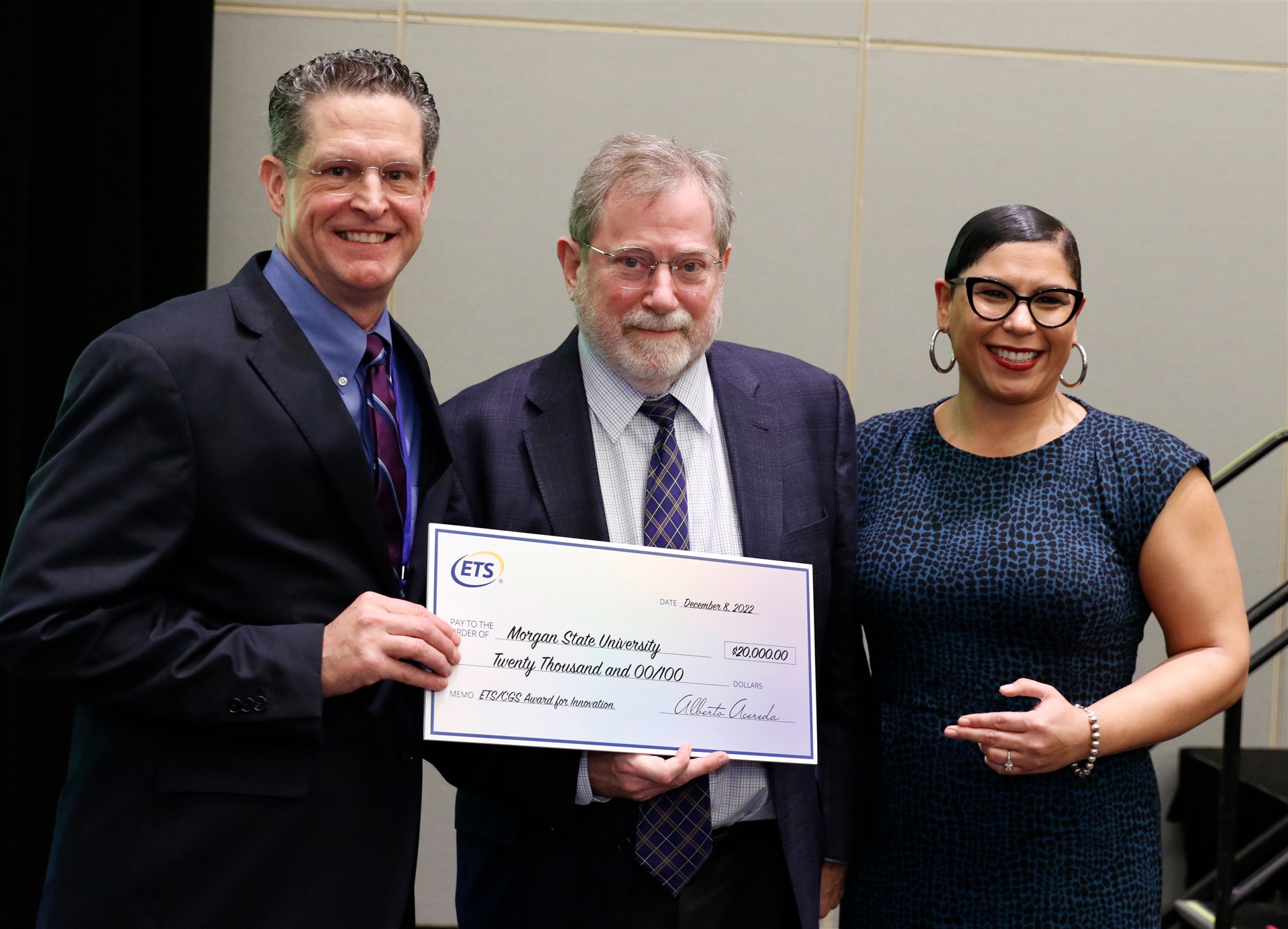 Mark Garrison receiving award check