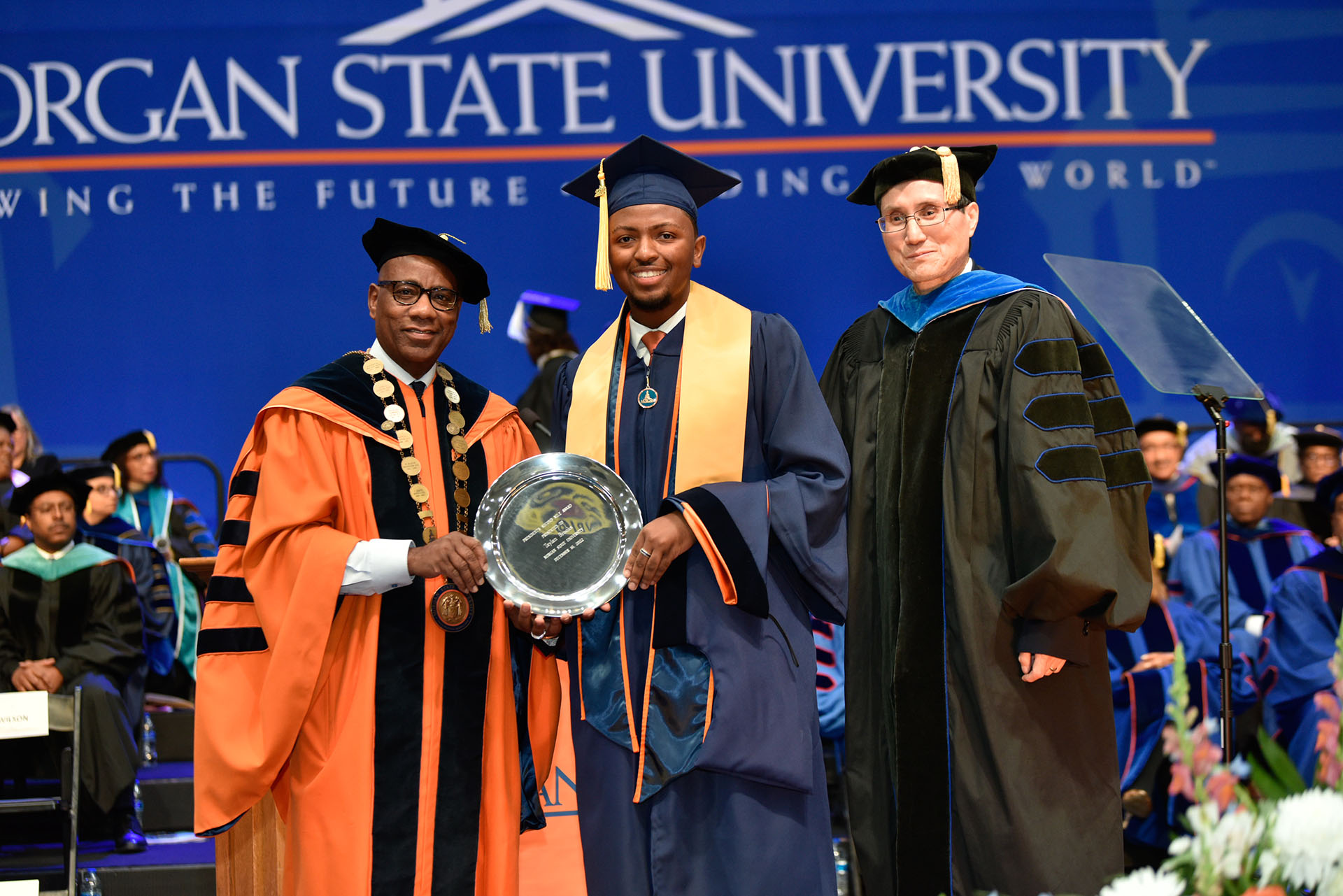 President David Wilson, Taylan Brooks, and Provost Hongtao Yu