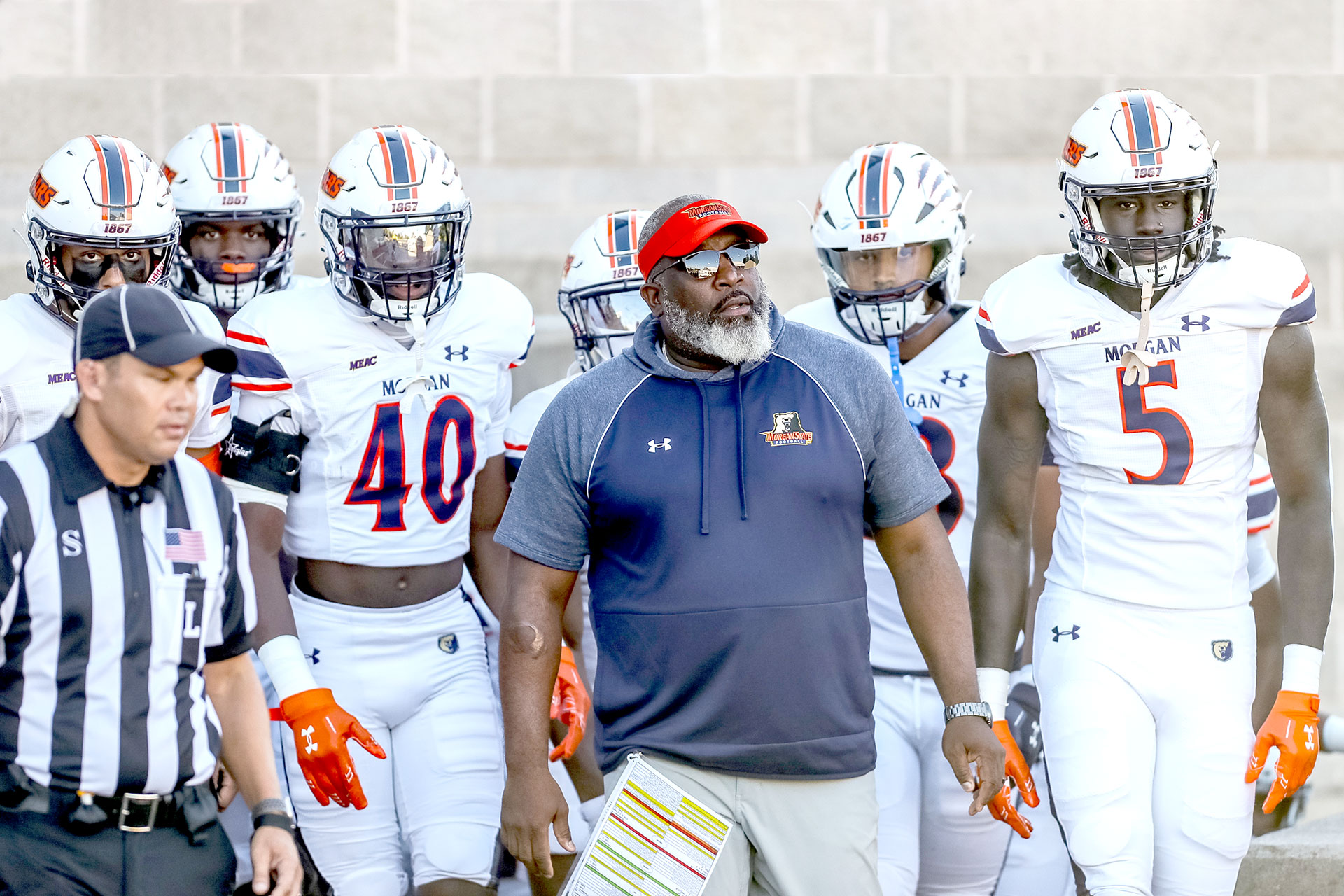 Coach Wilson with Football Team on sideline